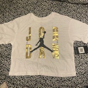 Girl’s Tee (Falls right above the waist)